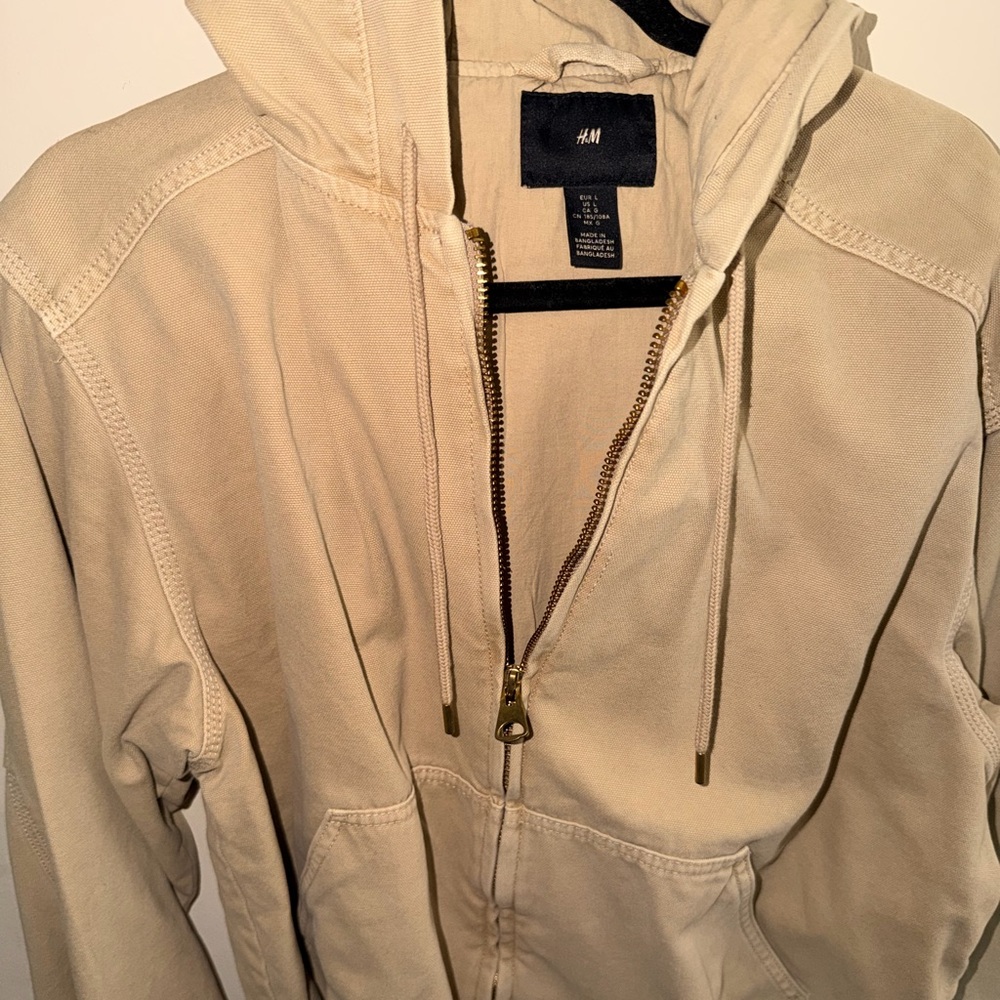 H&M Black and Cream Garment Label